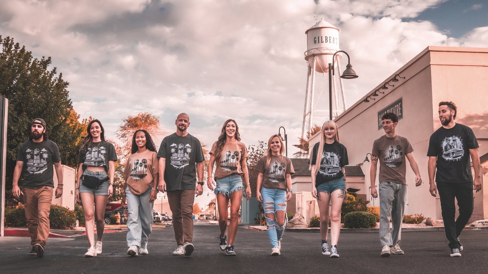 The Downtown Arizona crew walking downtown in Drop 01 shirts